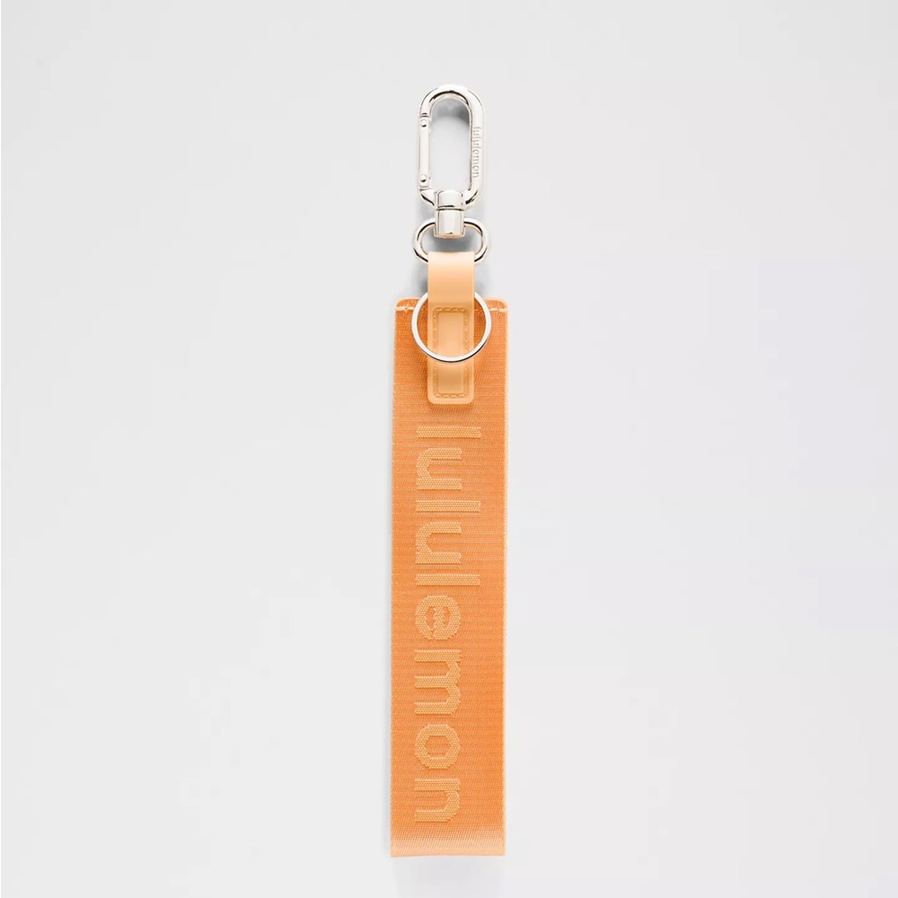 Lululemon Never Lost Keychain-Rock Melon/Lit Orange New with tags